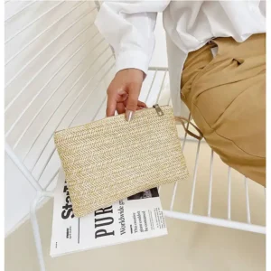 Pochette à main tissée avec lanière  marron